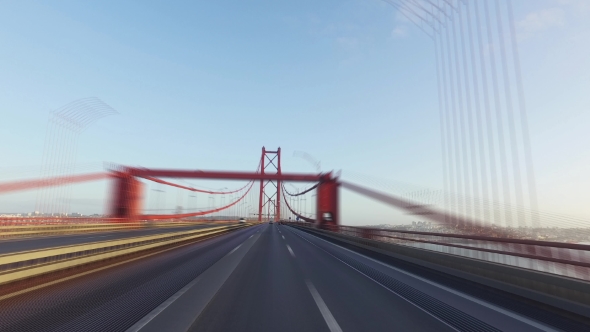 Speedy Driving On a 25 De Abril Bridge In Lisbon