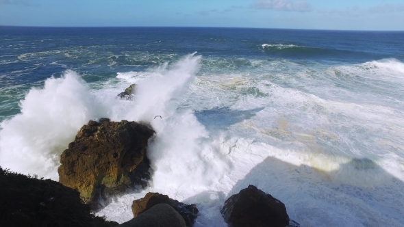 Big Ocean Waves Breaking On Rock