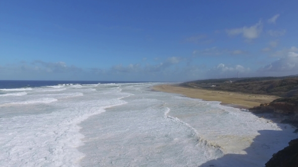 Ocean Waves Breaking On Beach
