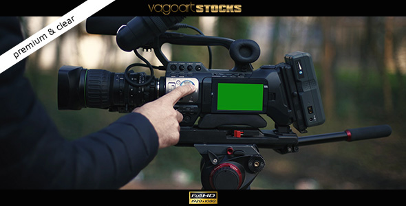 Cameraman Set Up the Broadcast Camera alt