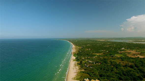 Rising Above a Tropical Coastline  alt