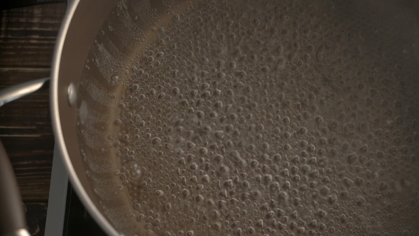 Water With Bubbles Boiling Hot