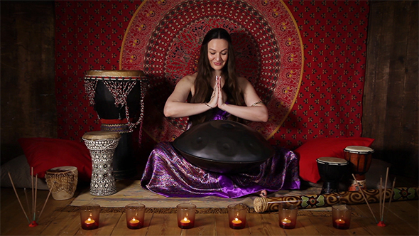 Woman Playing Hand Pan alt