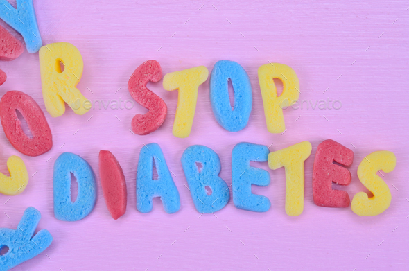 Stop Diabetes words on pink table
