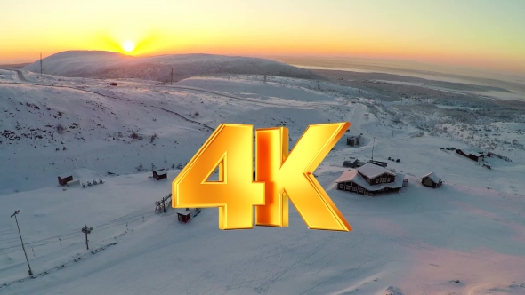 Flying Over Ski Resort In The North At Sunset alt