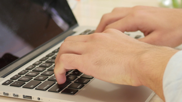 Typing on Laptop alt