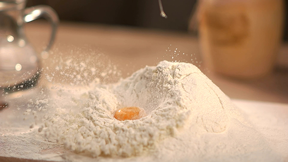Egg Falls Into Flour