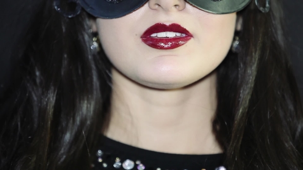  Of Red Lips a Beautiful Girl In a Mask