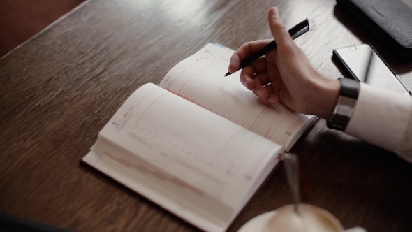 Pen And Pad Man's Hands  alt