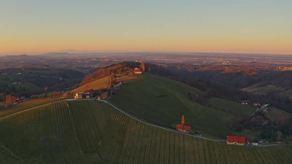 Aerial View of Vineyard Hils in South Styria, Tuscany Like Landscape. Sunset with Clear Sky, Spring
