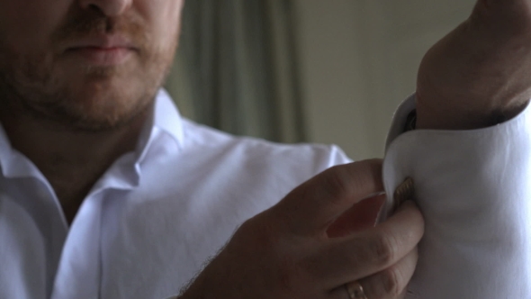 Man Wears White Shirt And Cufflinks alt