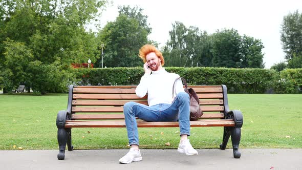 Sad Beard Man Talking on Phone, Reacting to Loss and Failure alt