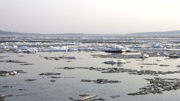   Ice Drift on the River in the Spring the Ice Floats on the River