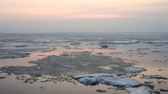 Evening Ice Drift On The River