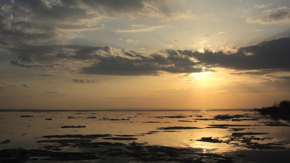   Sunset. Ice Drift On The River. In The Spring The Ice Floats