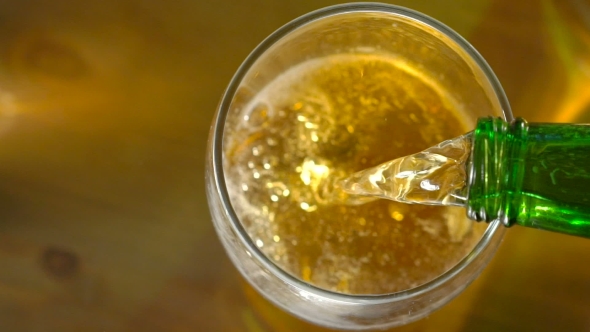 Beer Being Poured Into Glass