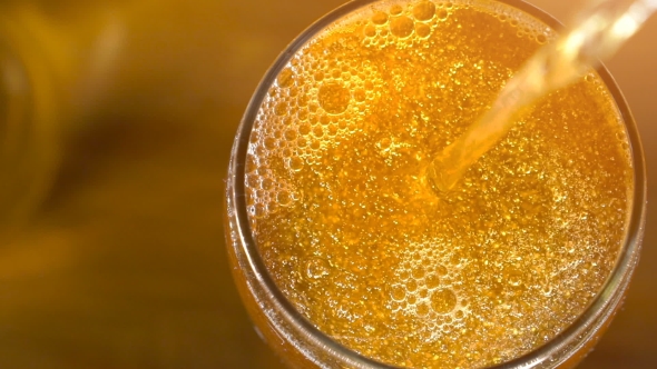 Golden Beer With Bubbles