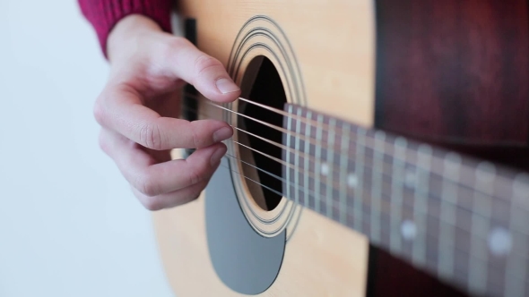 Man Playing An Acoustic Guitar 