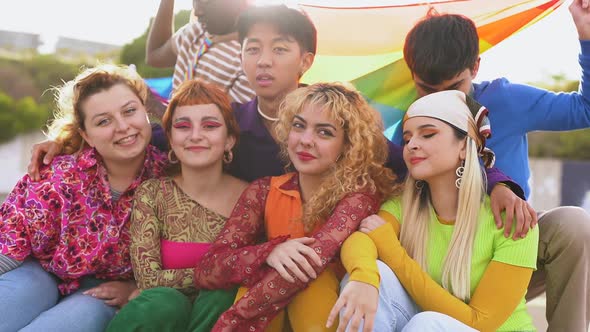 Young multiracial people celebrating together at LGBT pride parade