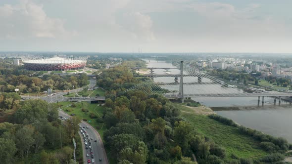 Panoramic Aerial view of Vistula River, Swietokrzyski Bridge and The PGE Narodowy National Stadium alt