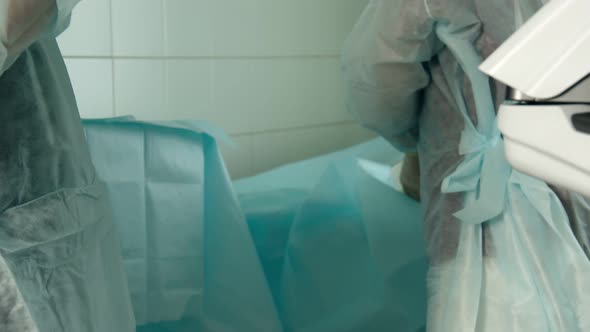 The Doctor Puts on Gloves alt