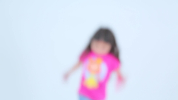 Little Girl Smiling  On The White Background