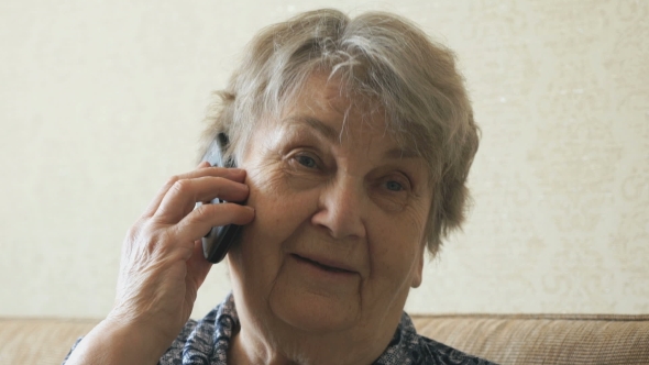 Old Woman Talking On a Mobile Phone