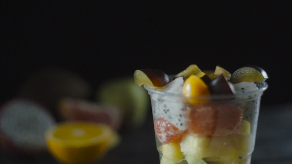 Slices Of Plum Adds a Fruit Cocktail Cup