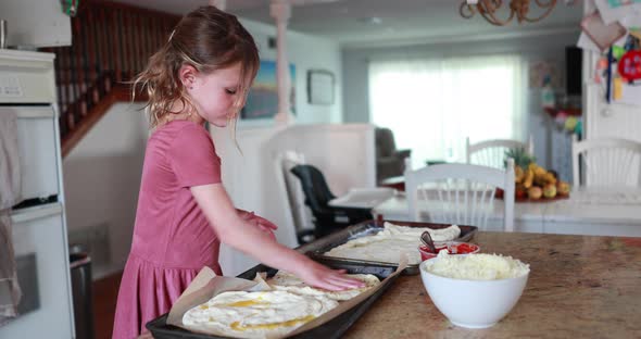 Young Girl Making Pizza