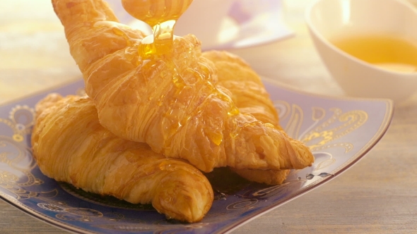 Breakfast With Croissant, Cup Of Coffee And Honey