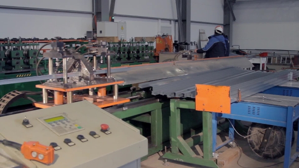 Metal Cutting Machine And Workers