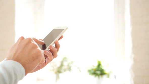 Man Using Smart Phone alt