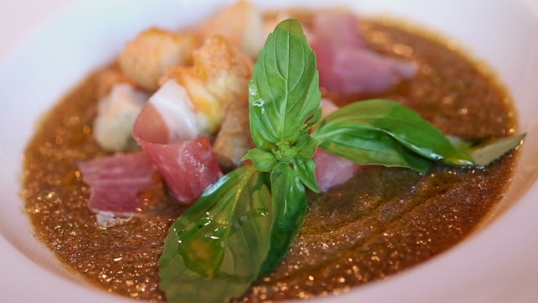 Soup With Slices Of White Bread And Jamon