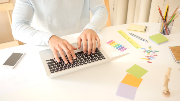 Freelancer Working In Studio On Laptop alt