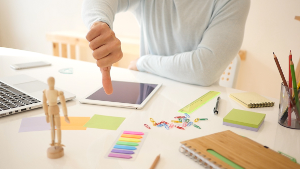 Young Man Doing Thumps-down alt