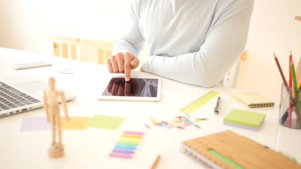 Creative Freelance Designer Working with tablet Pc alt