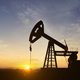 Silhouette Of Crude Oil Pump At Sunset In Oil Field - VideoHive Item for Sale