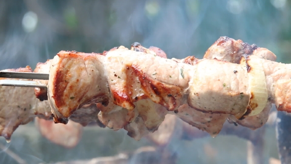 Smoky Grilling The Marinated Pork Meat Shashlik.