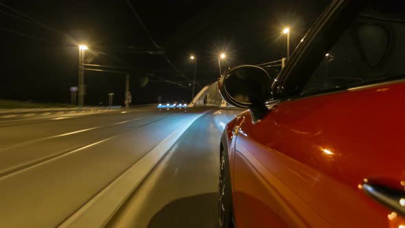 Car Moves at Fast Speed at the Night Streets Timelapse Hyperlapse Drivelapse. alt