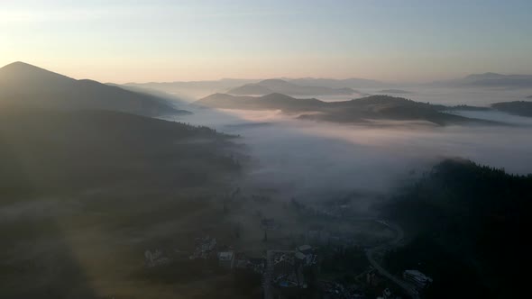 Sunrise Above Carpathian Village in Ukraine