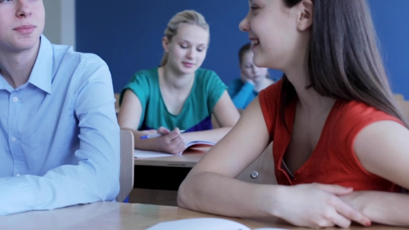 Happy Students Talking On Lesson At School 14 alt