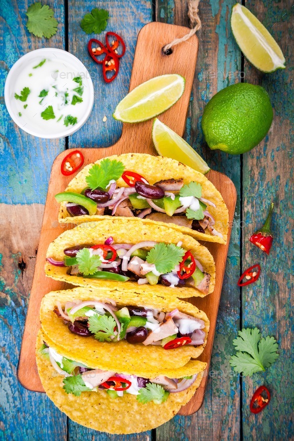 corn tacos with pork and vegetables