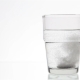 Mans Hand Pouring Fizzy Tablet In Glass Of Water - VideoHive Item for Sale