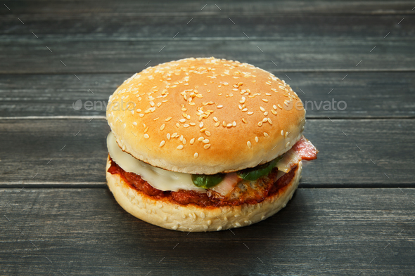 Meet and cheese burger at rustic wood - Stock Photo - Images