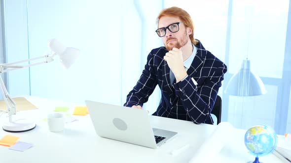 Pensive Redhead Businessman Thinking New Idea at Work, Creative Designer alt