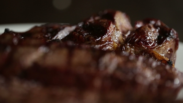 Large Pieces Of Meat Roasted On a Grill