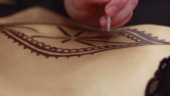 Mehendi. Drawing On Female Body With Henna