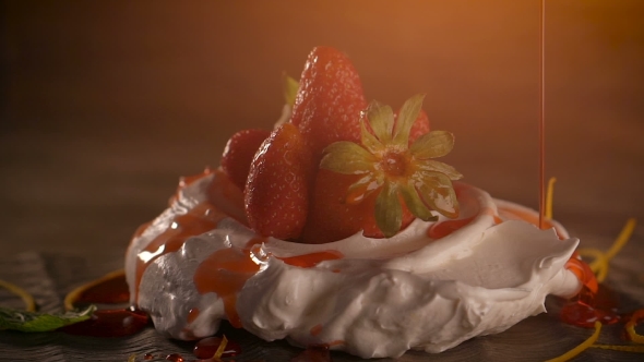 Meringue 'With Strawberries And Strawberry Sauce.
