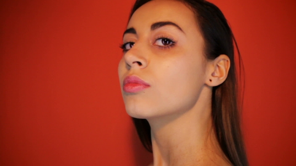 Portrait Of Adorable Beauty Posing While Isolated Red Background alt