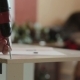 Man Assembles Furniture Using a Power Screwdriver - VideoHive Item for Sale